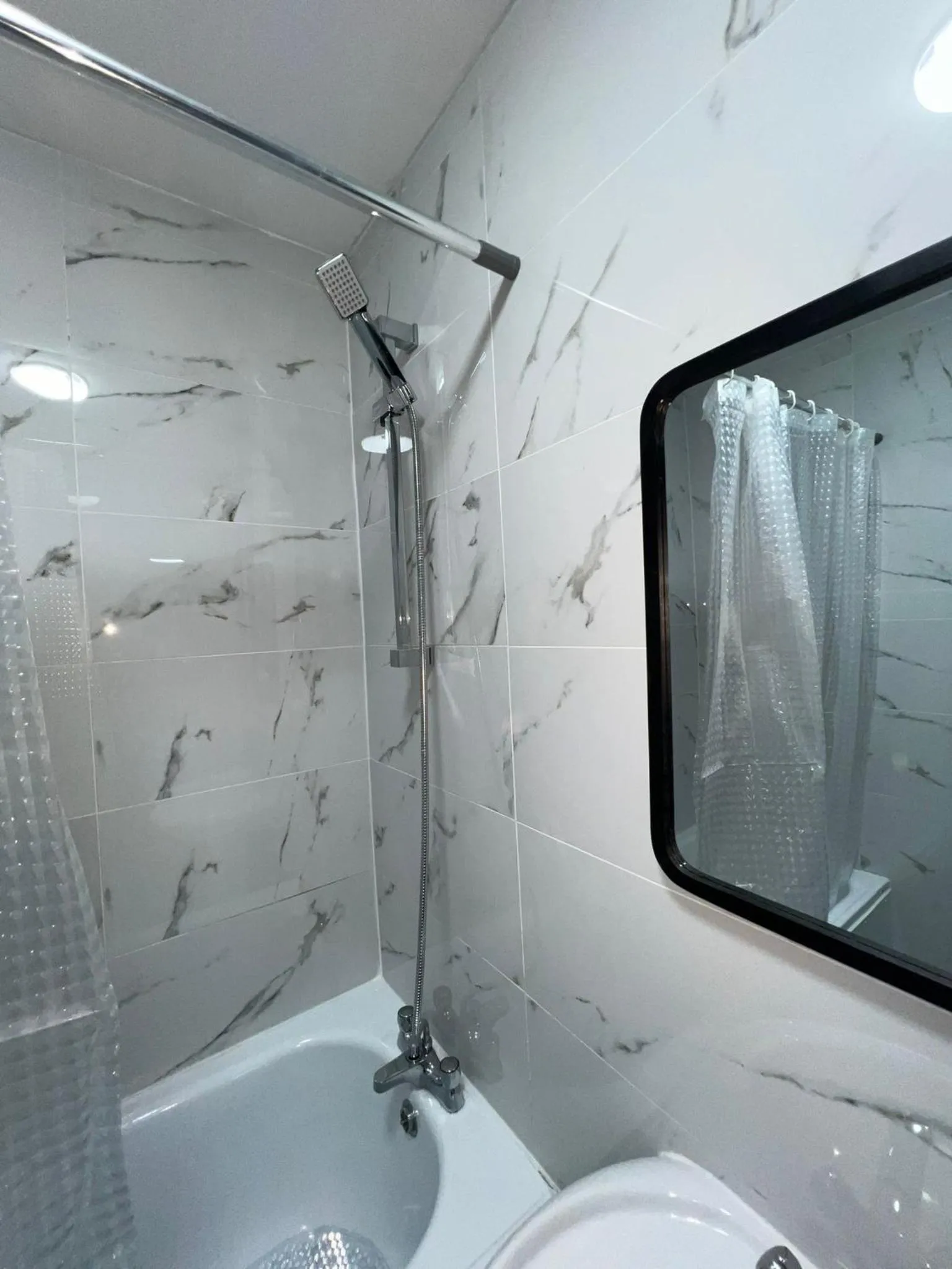 Bathroom in OYO Greenway Stays