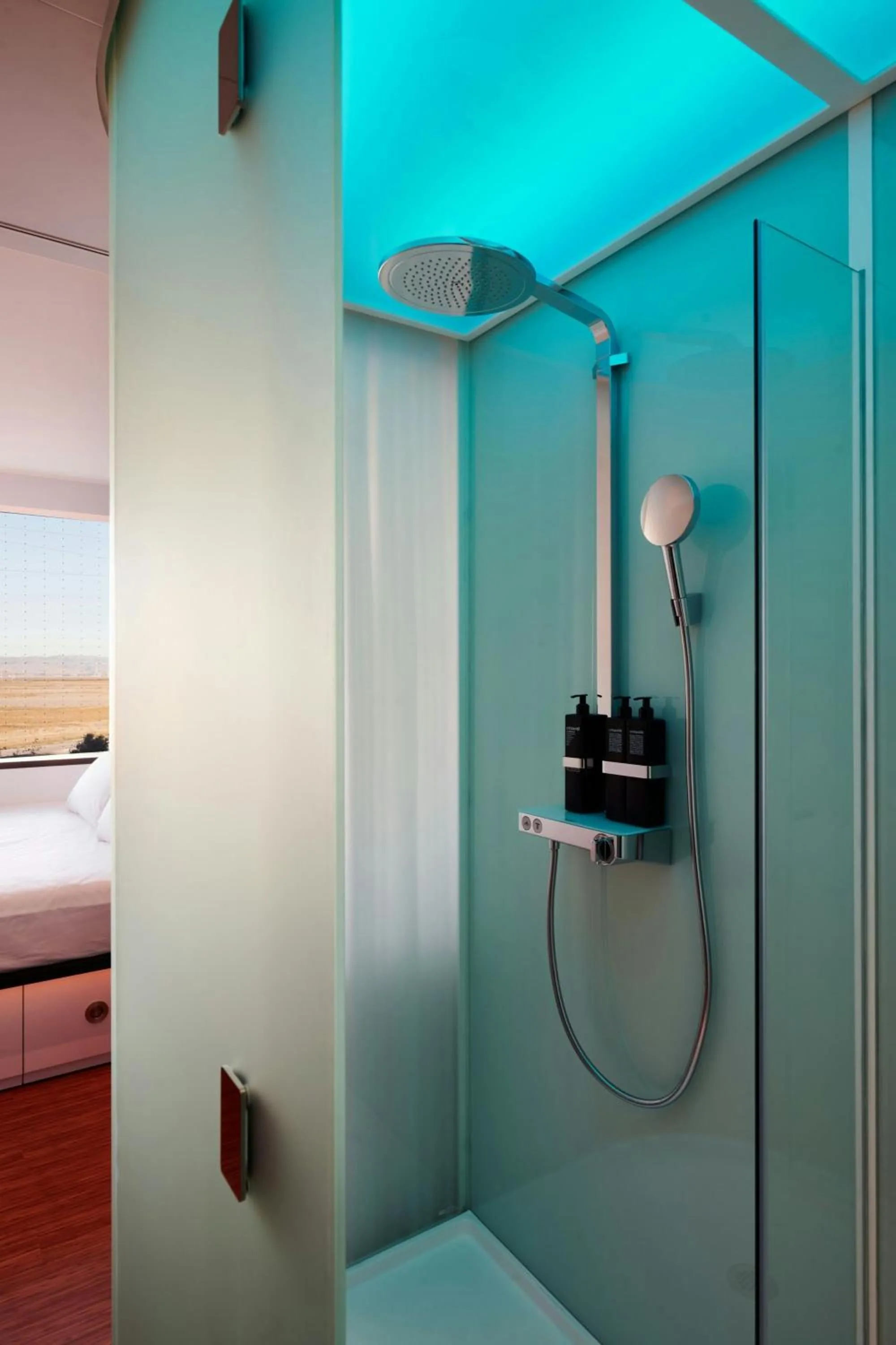 Bathroom, Bed in citizenM Schiphol Airport