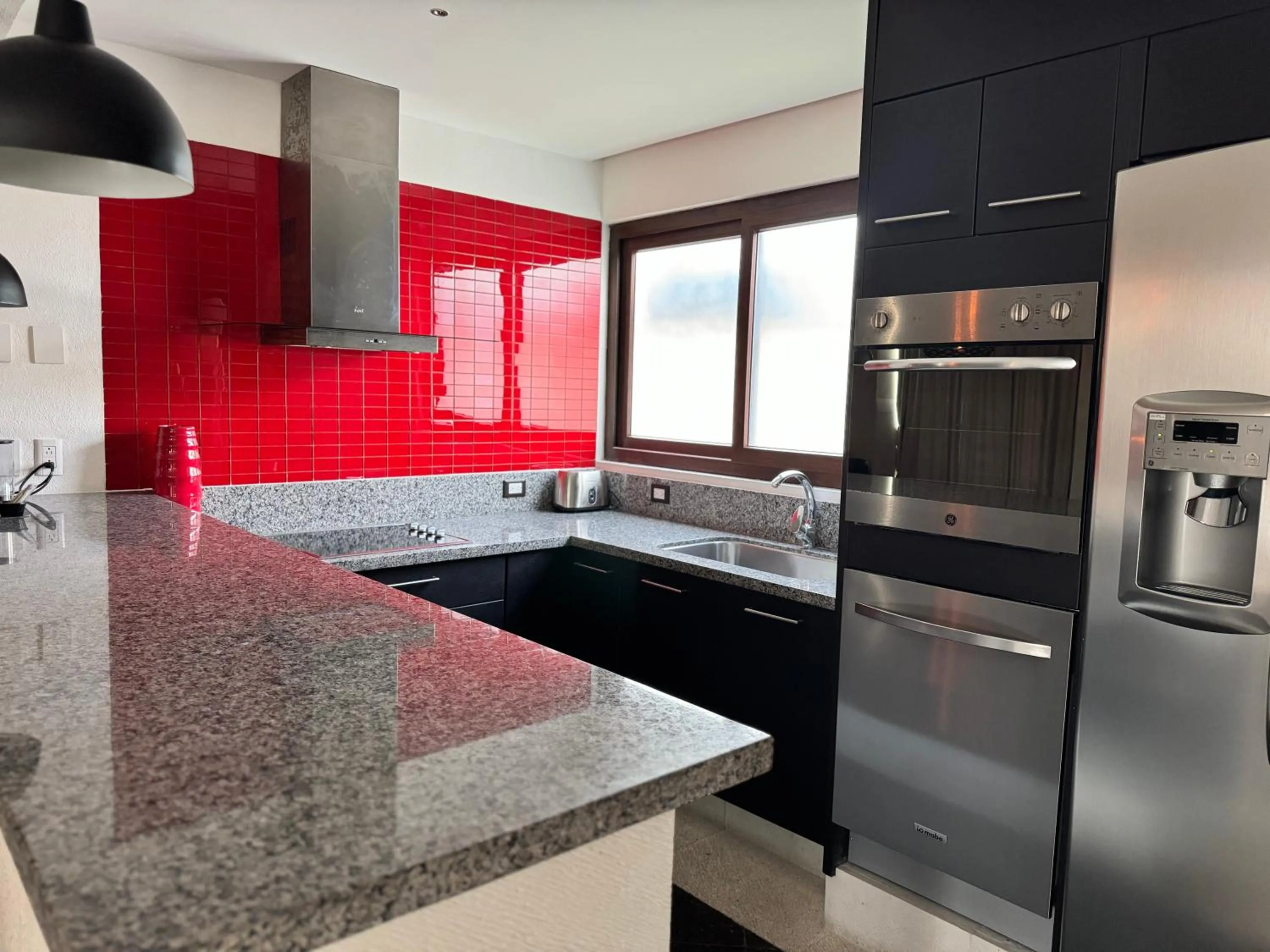 kitchen in Ilo Rojo Hotel Boutique