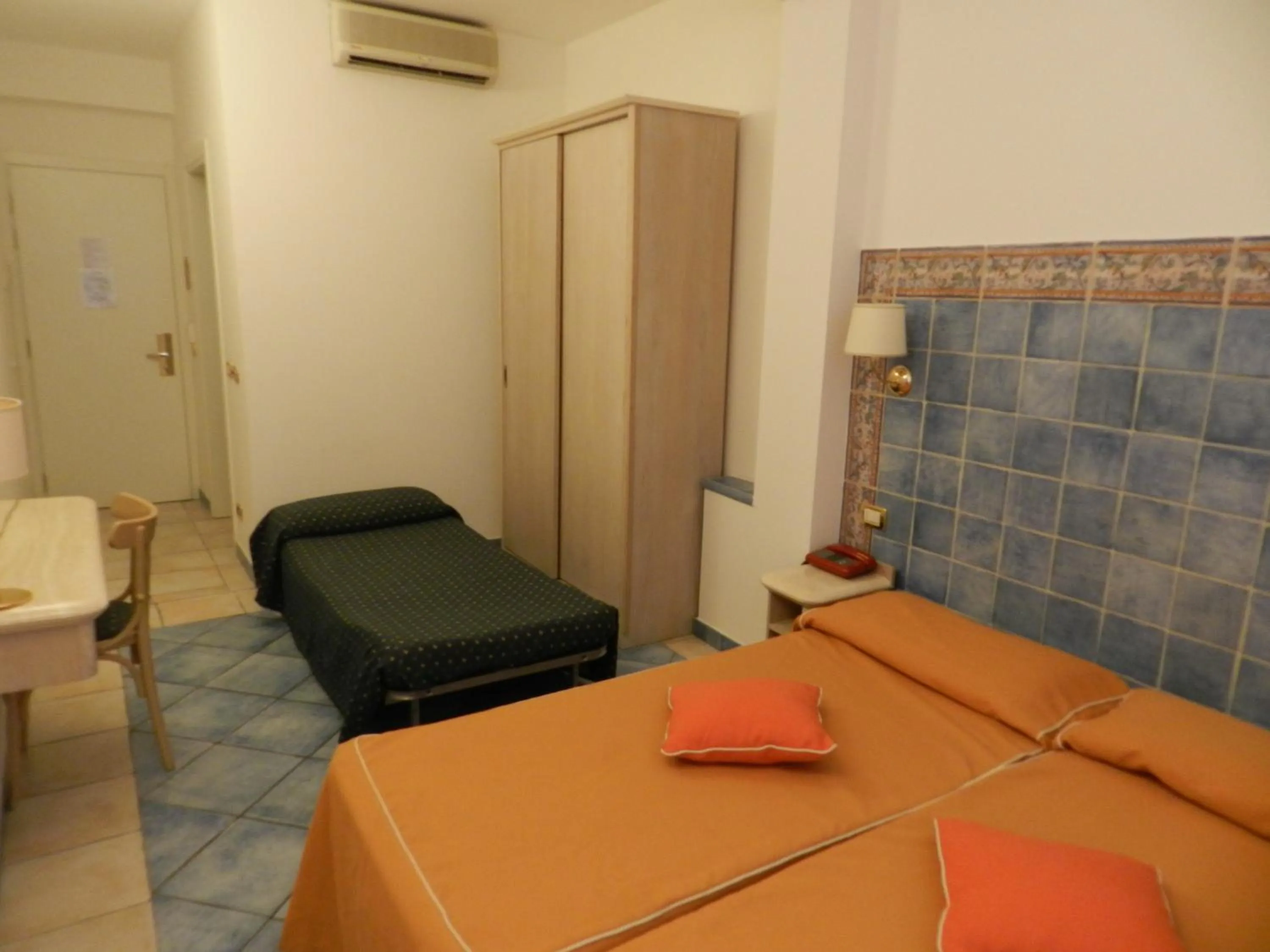 Decorative detail, Bed in Hotel Punta Mesco