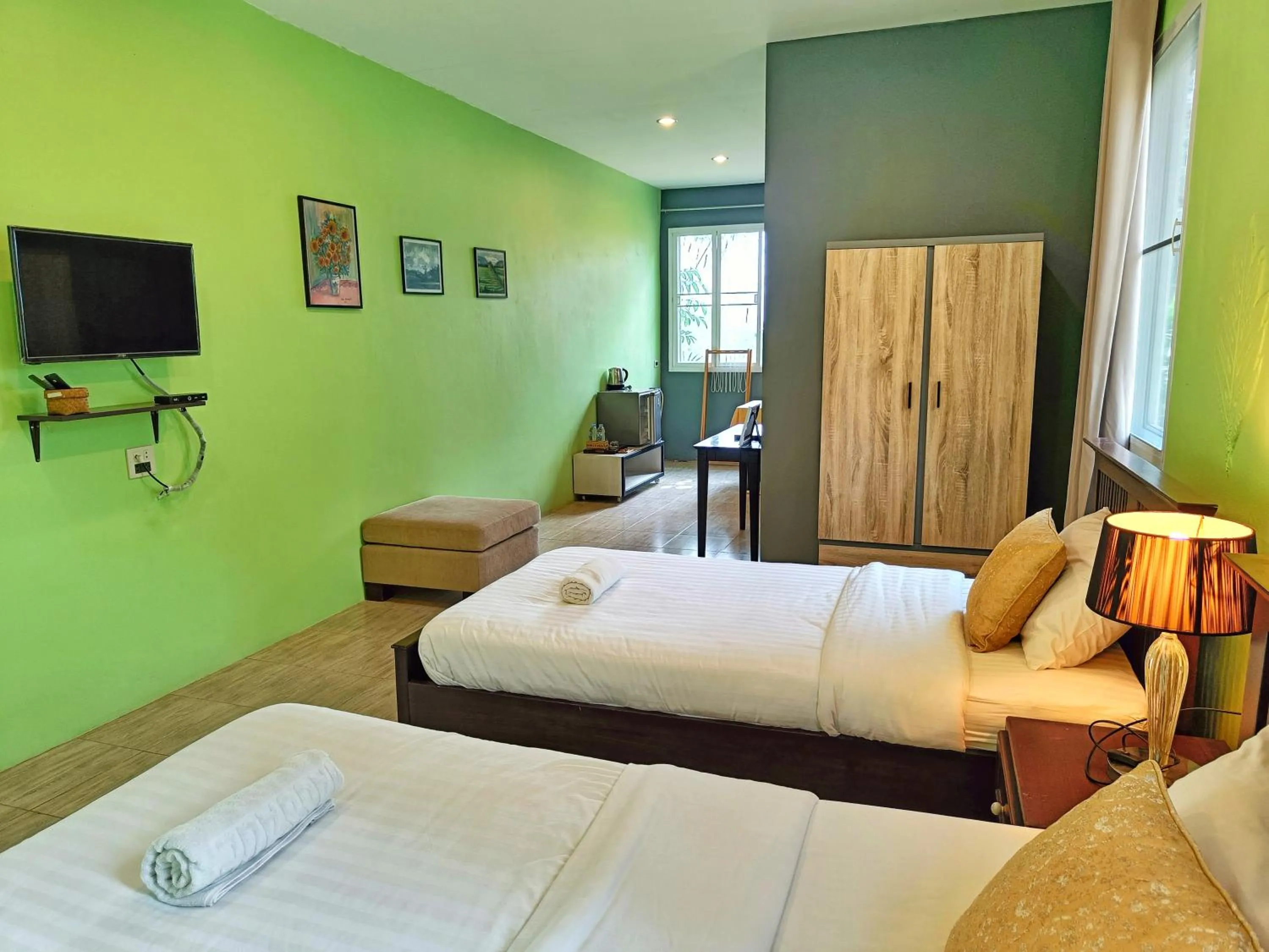 Communal lounge/ TV room, Bed in Kong Garden Resort