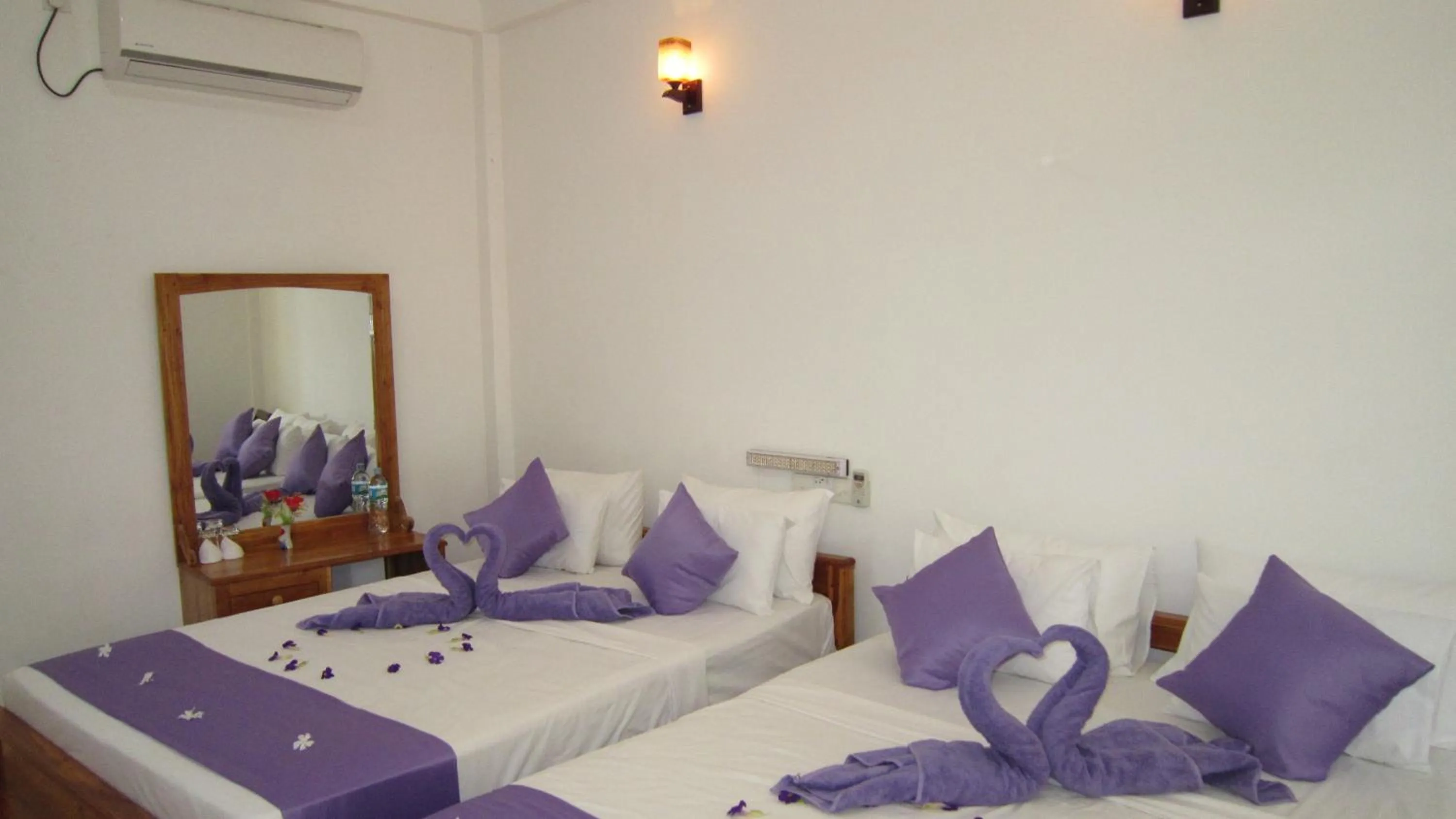 Bed in Hotel Gayan's