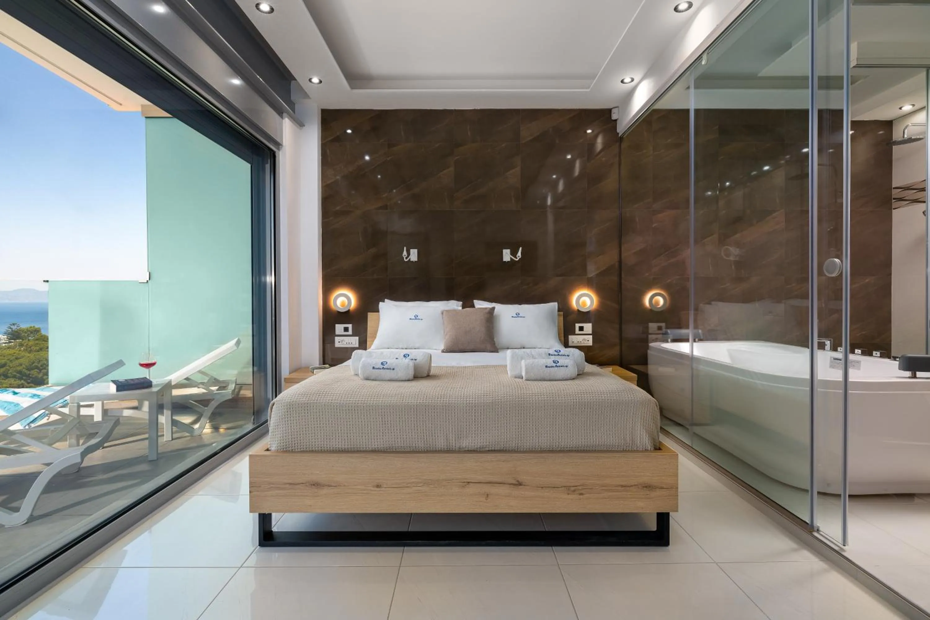 Shower, Bed in Rhodes Skyline Suite with out Door Jacuzzi Sea View A2