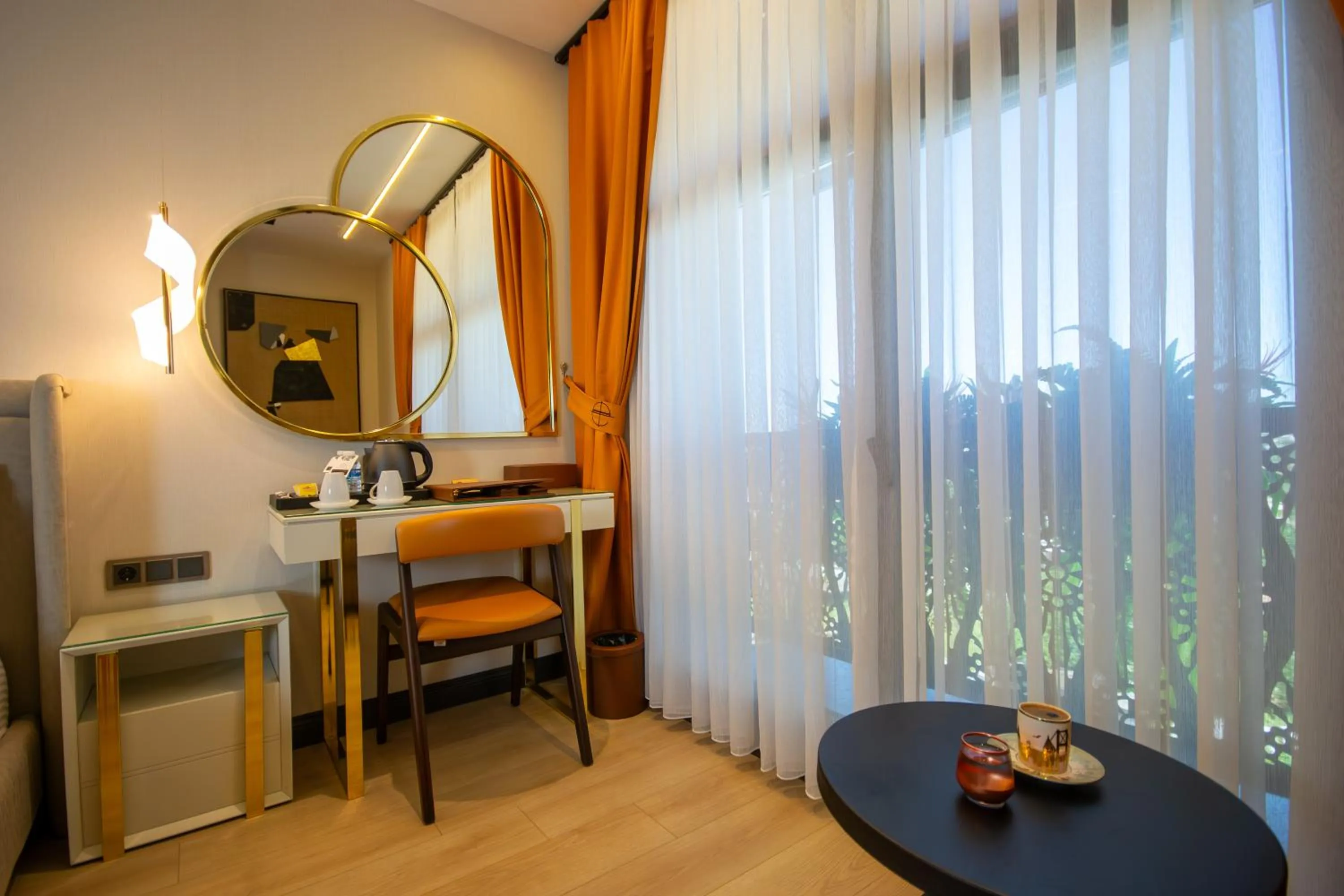 air conditioner, Bed in Elysian Airport Hotel & Restaurant