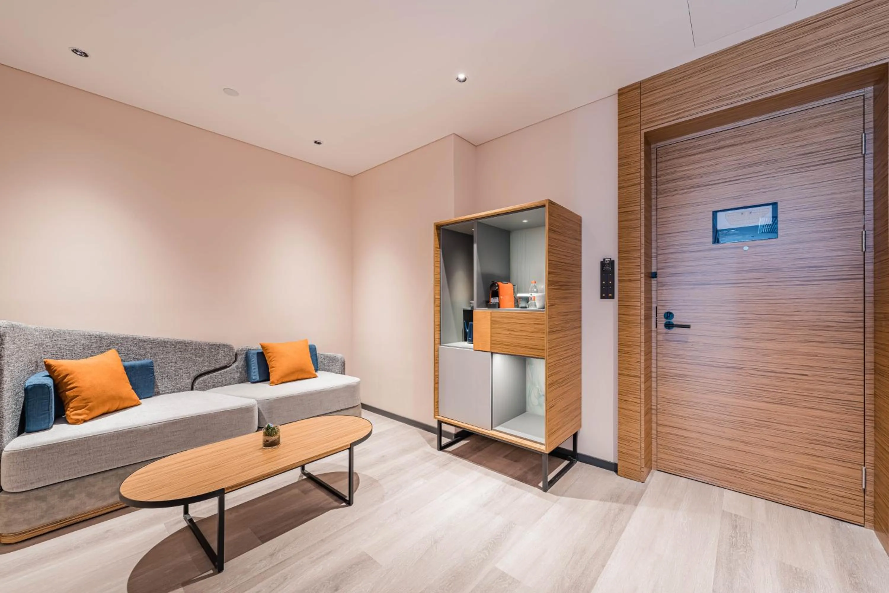 Living room, Bed in UrCove by HYATT Hangzhou Riverside CBD