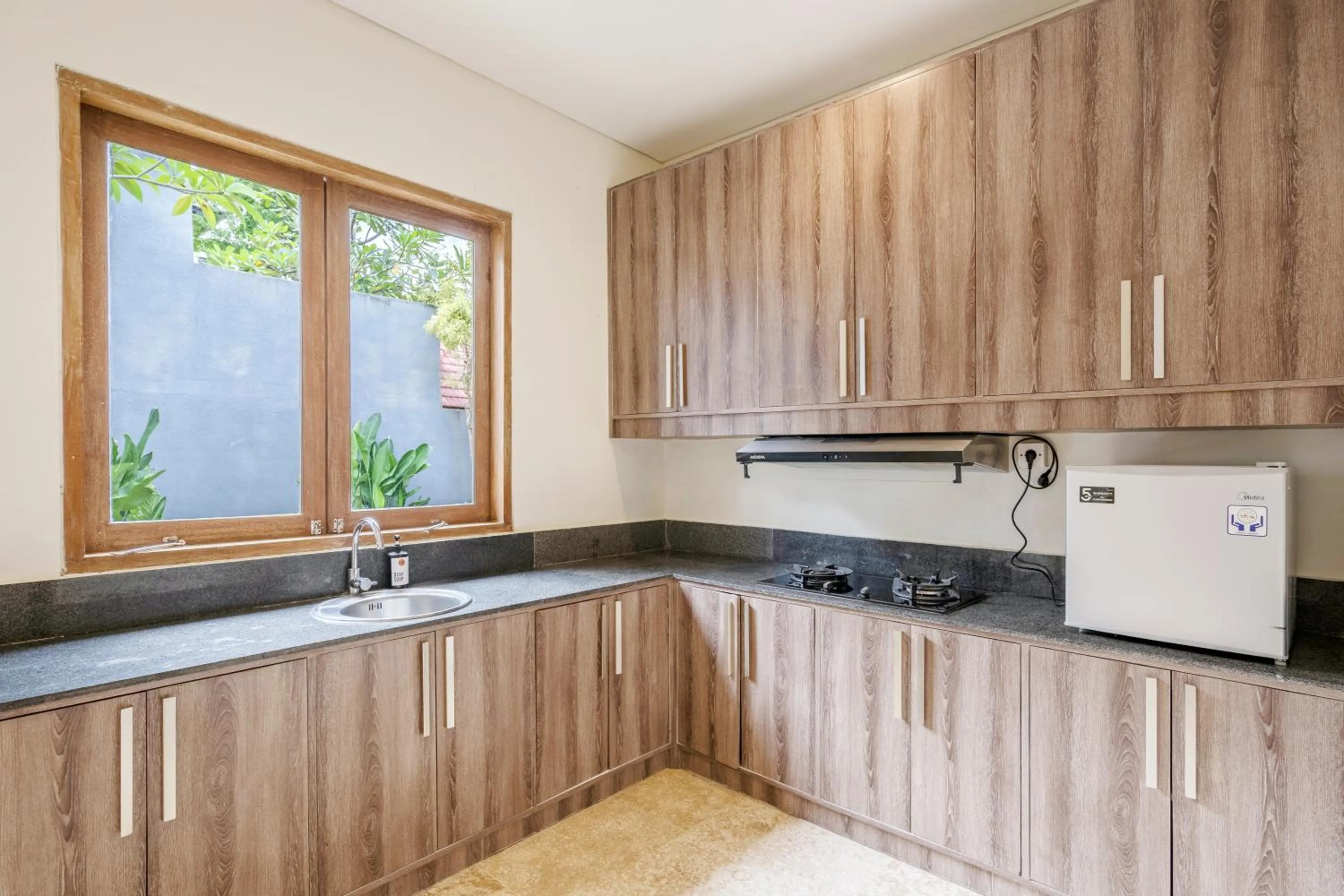 Kitchen or kitchenette in Kings Villas Sanur by Moria