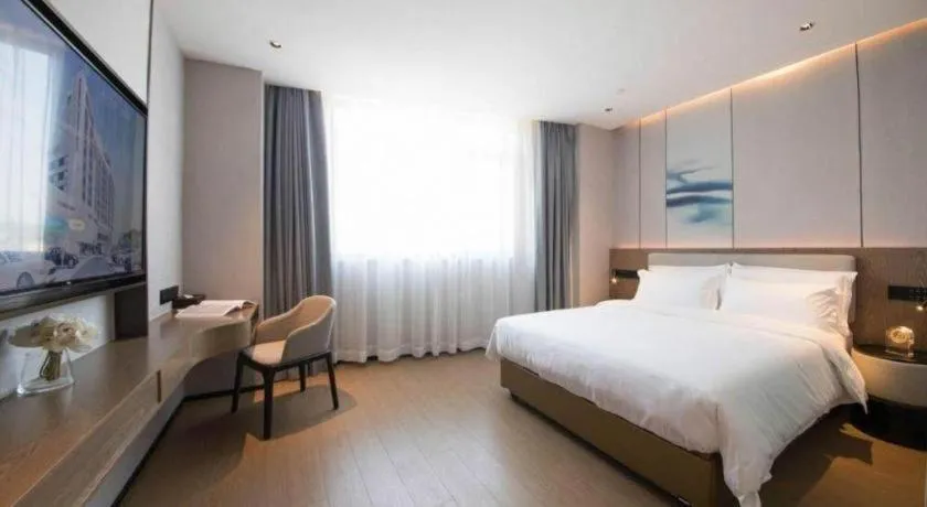 Bed in Yian Business Hotel