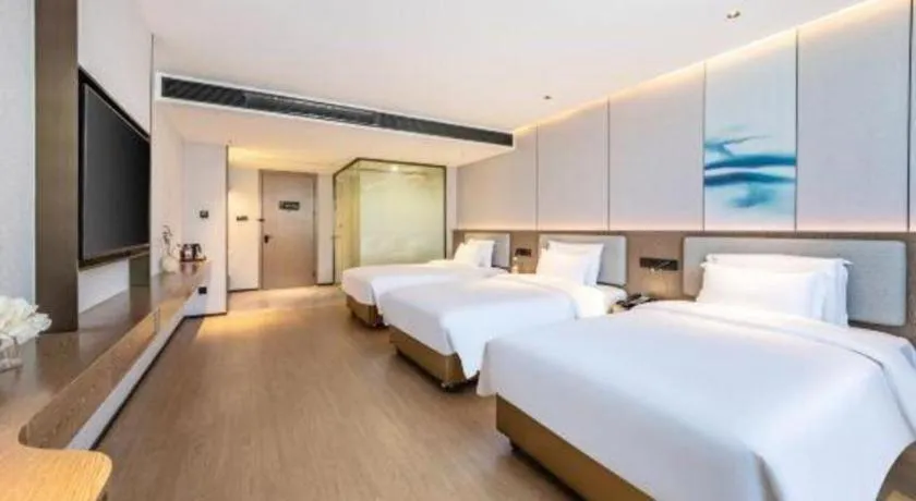 Bed in Yian Business Hotel