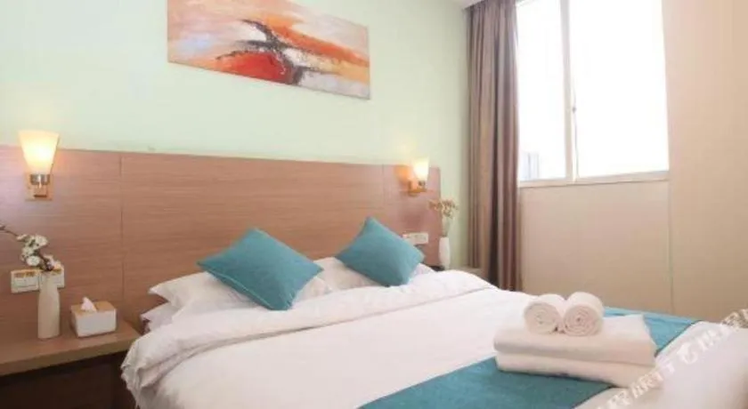 Bed in Yian Business Hotel