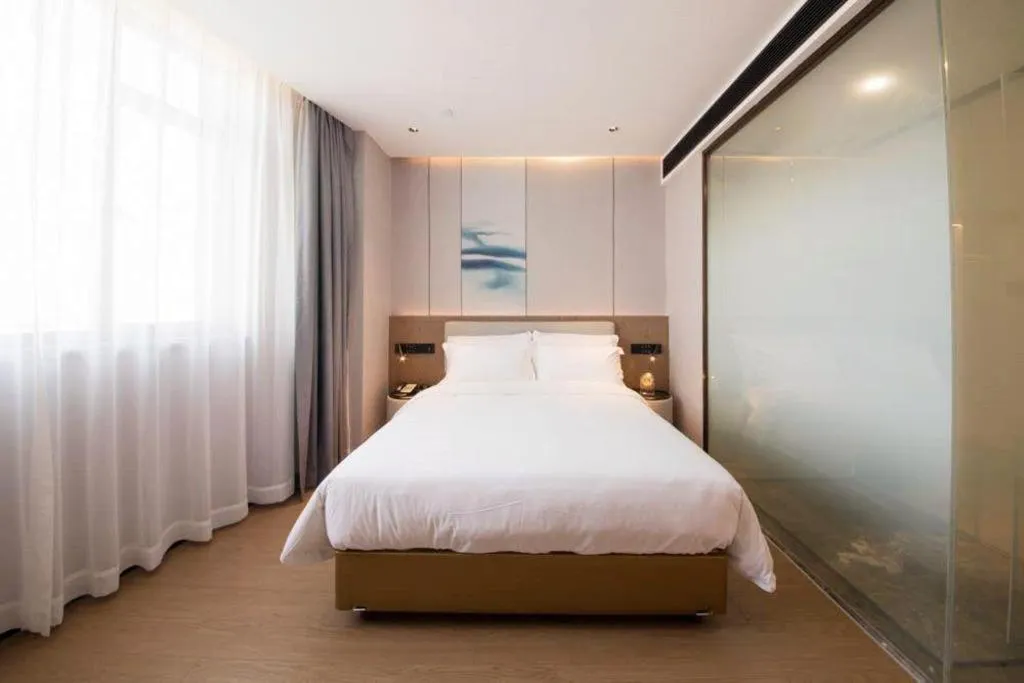 Bed in Yian Business Hotel