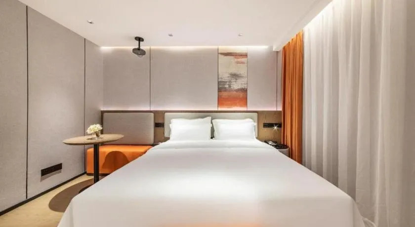 Bed in Yian Business Hotel