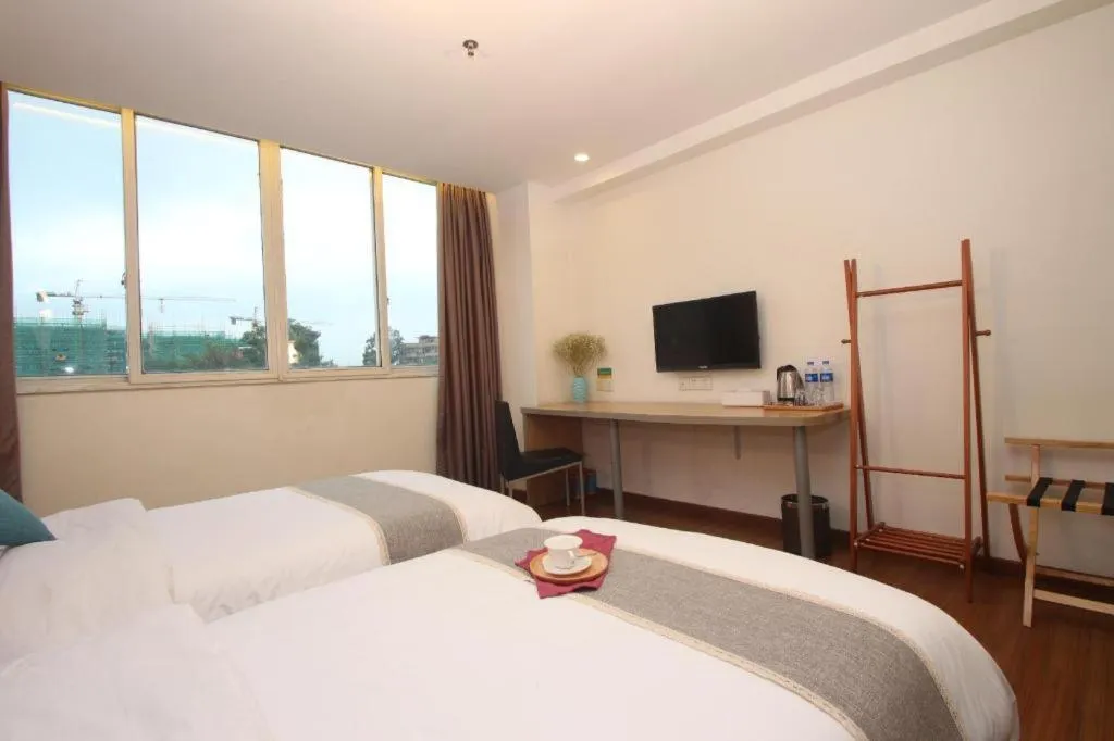 Bed in Yian Business Hotel