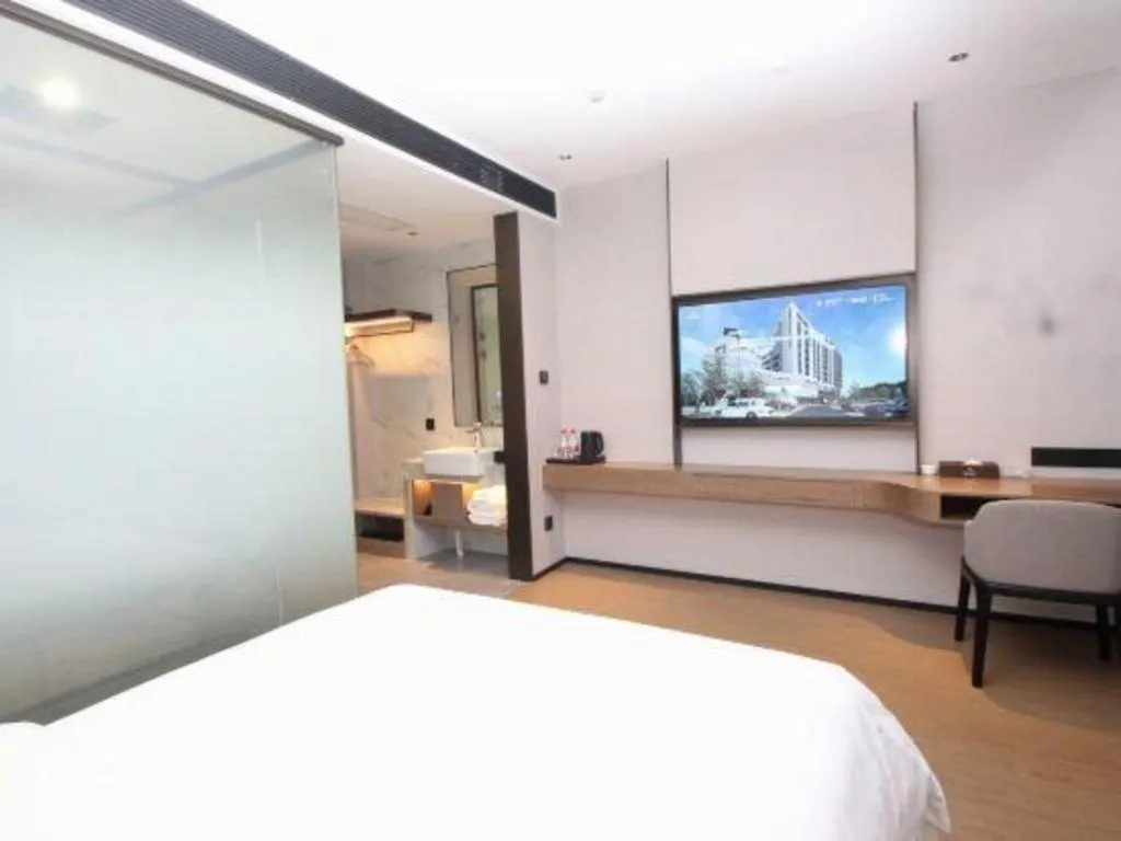 Bed in Yian Business Hotel