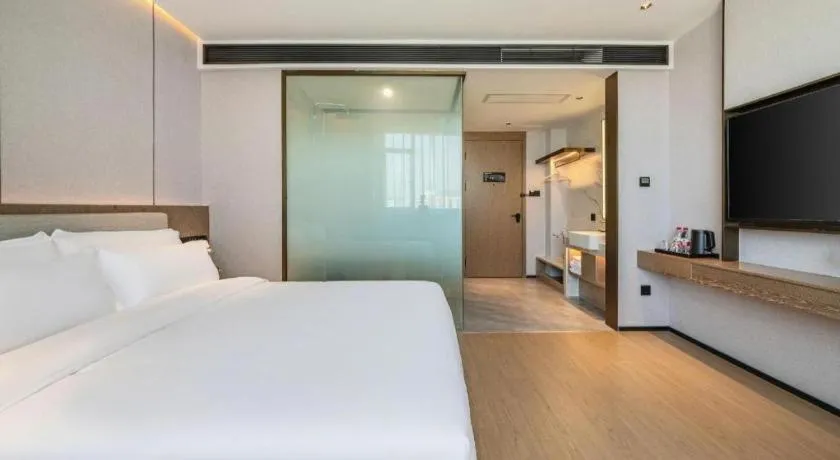 Bed in Yian Business Hotel