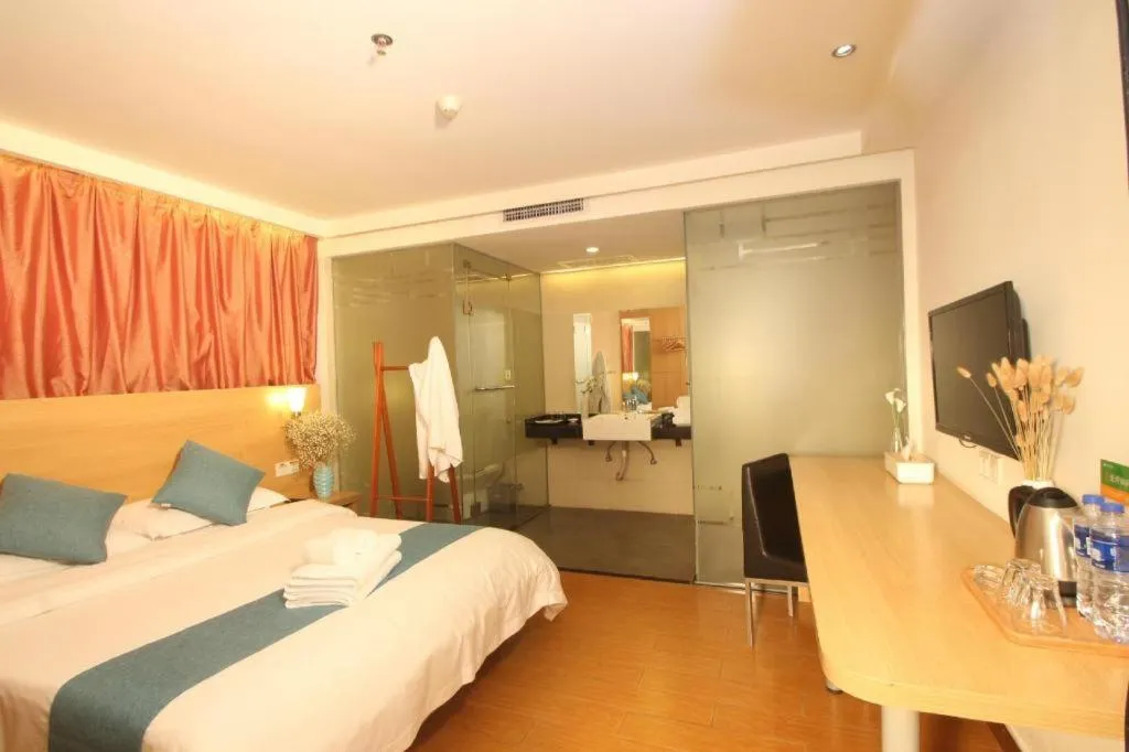 Bed in Yian Business Hotel