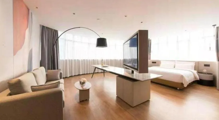 Bed in Yian Business Hotel