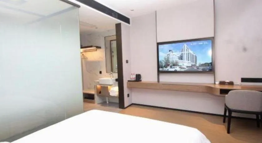 Bed in Yian Business Hotel