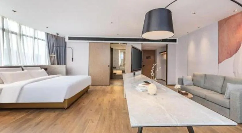 Bed in Yian Business Hotel