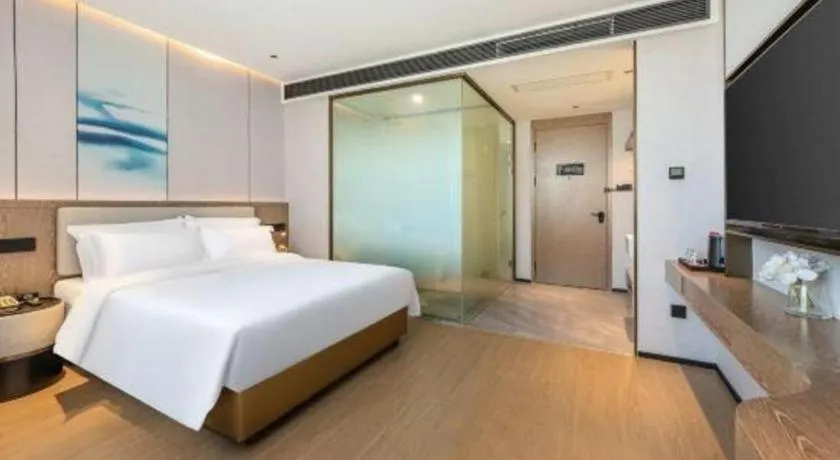 Bed in Yian Business Hotel