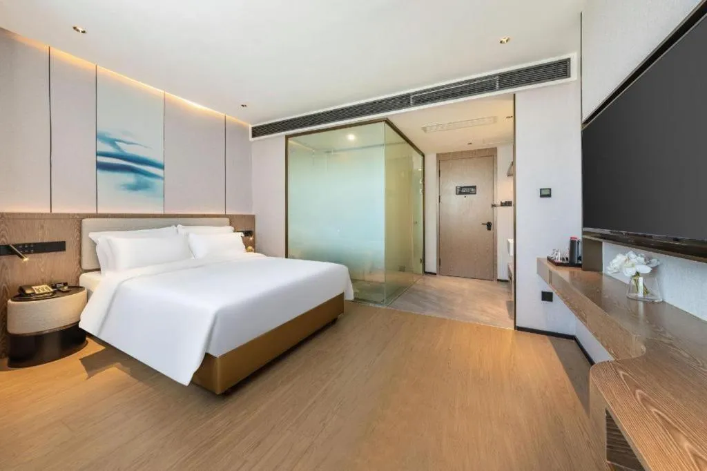 Bed in Yian Business Hotel