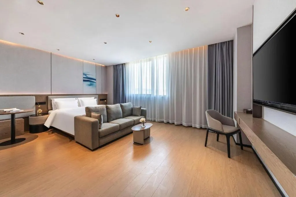 Bed in Yian Business Hotel