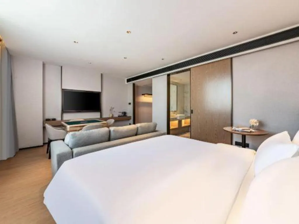 Bed in Yian Business Hotel