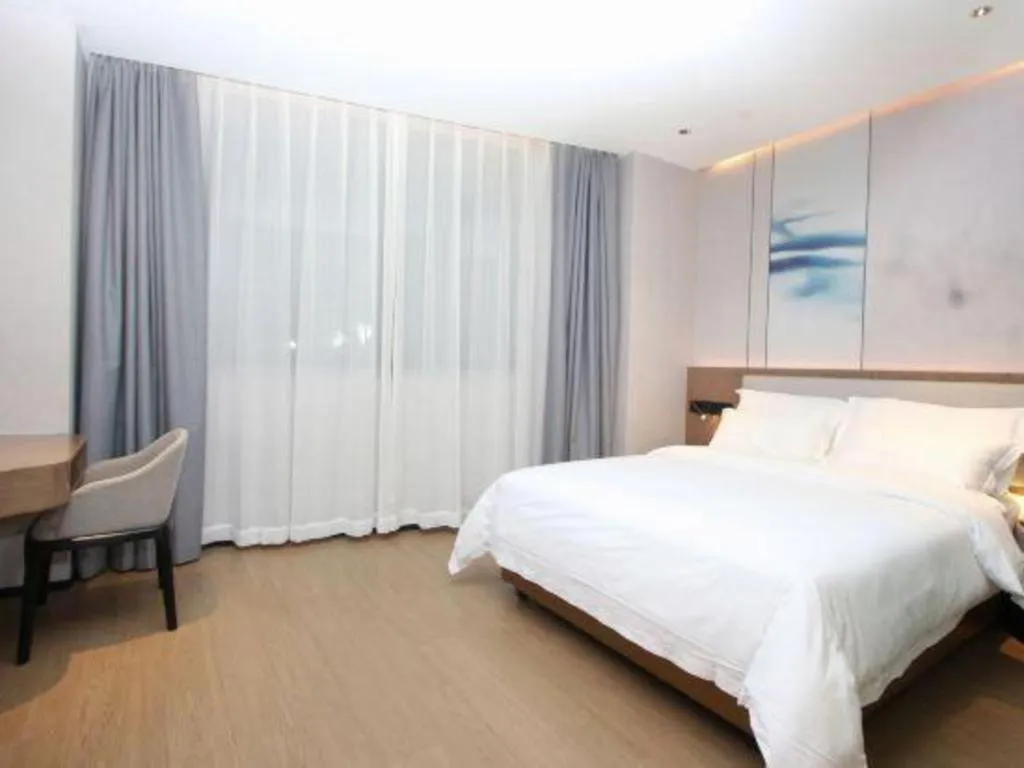 Bed in Yian Business Hotel