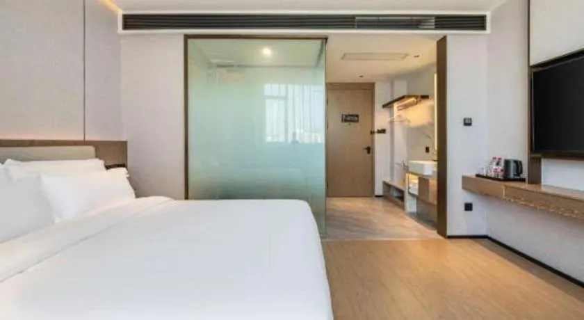 Bed in Yian Business Hotel