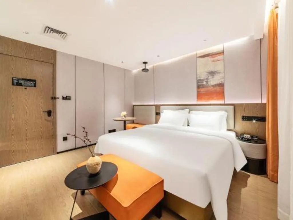 Bed in Yian Business Hotel