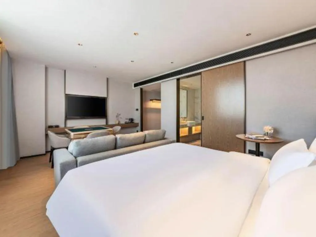 Bed in Yian Business Hotel