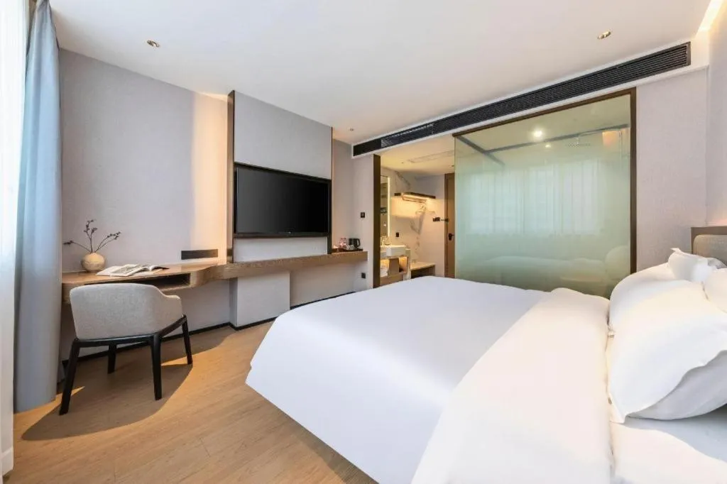 Bed in Yian Business Hotel
