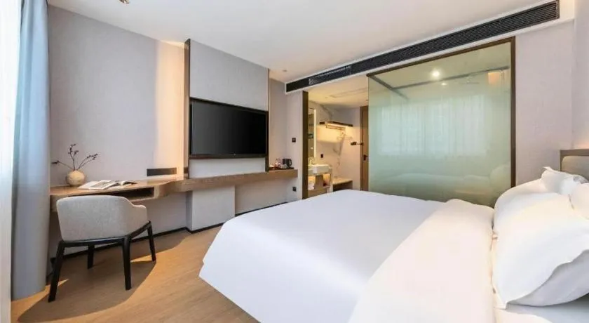 Bed in Yian Business Hotel