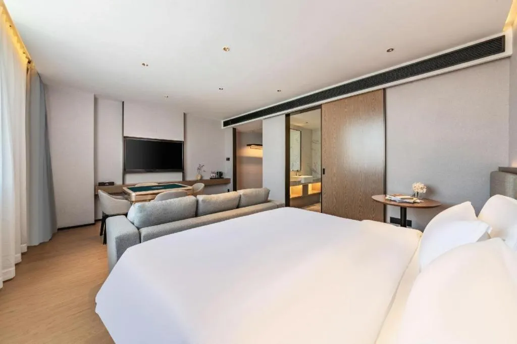 Bed in Yian Business Hotel