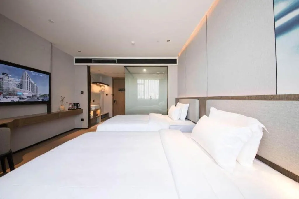 Bed in Yian Business Hotel