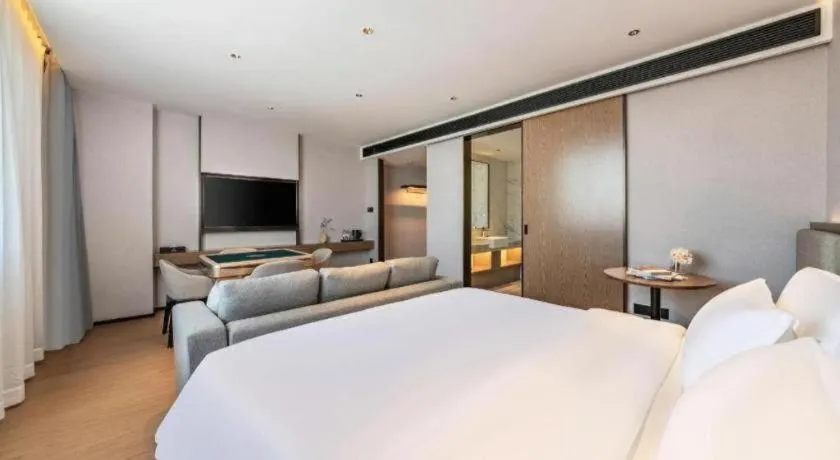 Bed in Yian Business Hotel