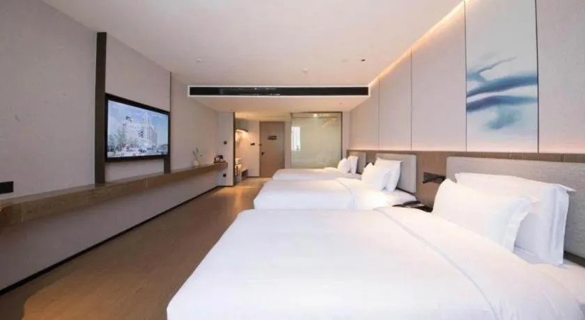 Bed in Yian Business Hotel