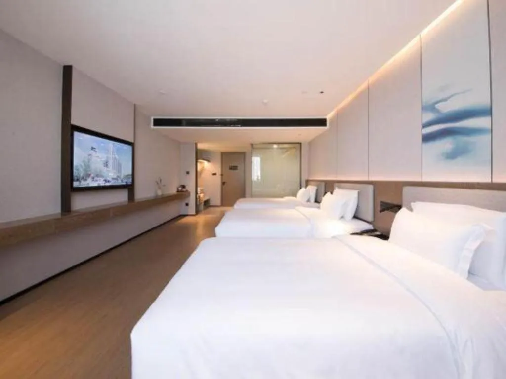 Bed in Yian Business Hotel