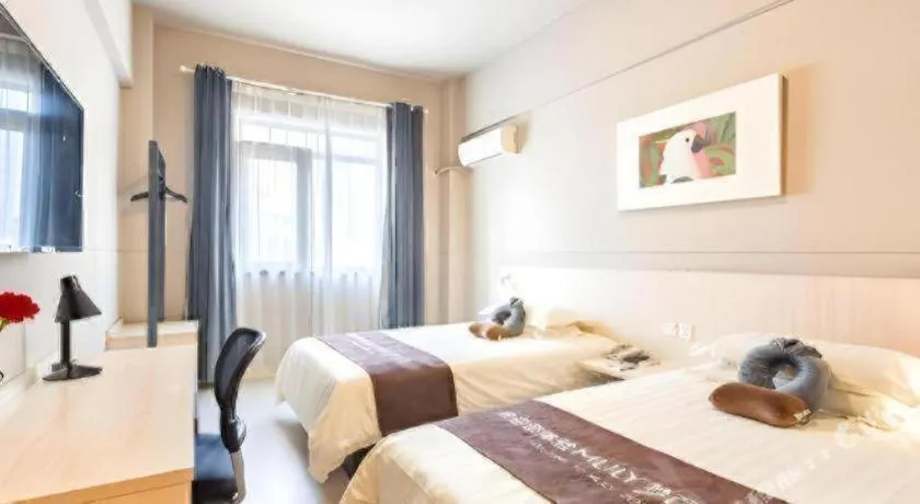 Bed in Jinjiang Inn Wuxi Liangqing Road Wanda Plaza Yunhe Bay Industrial Center