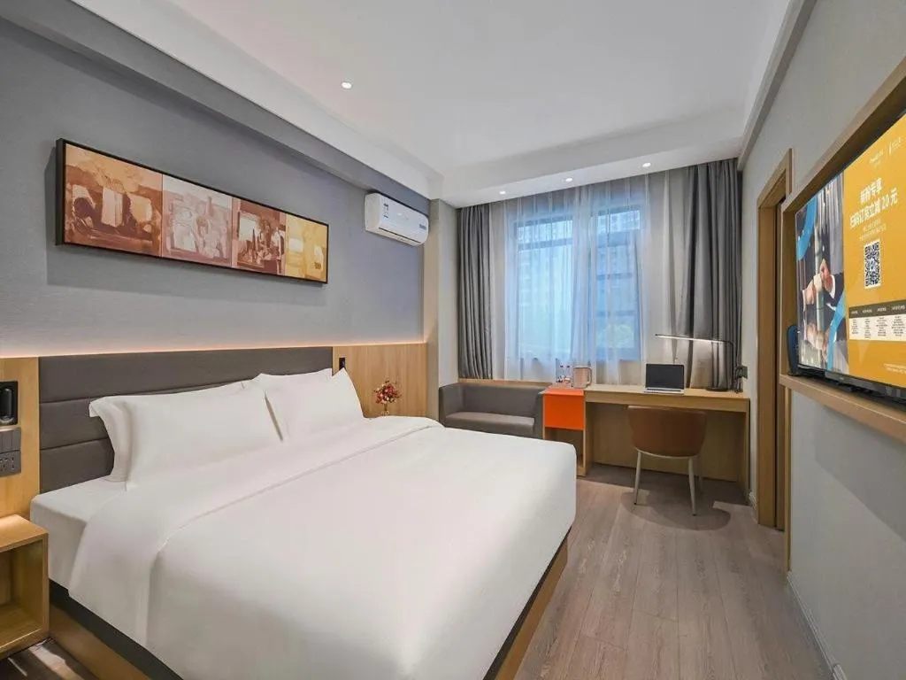 Bed in Jinjiang Inn Wuxi Liangqing Road Wanda Plaza Yunhe Bay Industrial Center