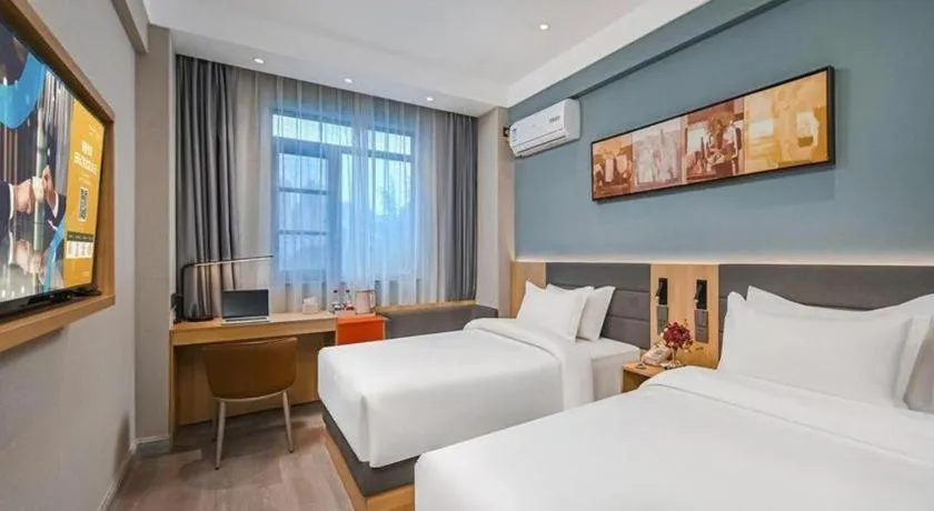 Bed in Jinjiang Inn Wuxi Liangqing Road Wanda Plaza Yunhe Bay Industrial Center