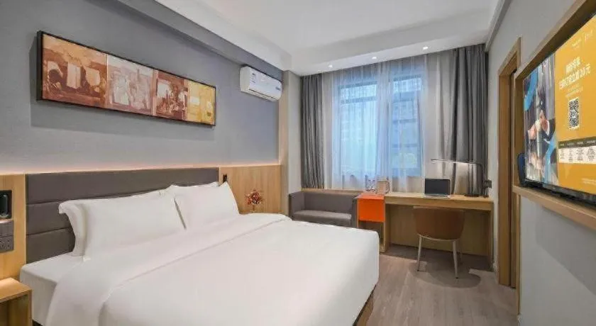 Bed in Jinjiang Inn Wuxi Liangqing Road Wanda Plaza Yunhe Bay Industrial Center