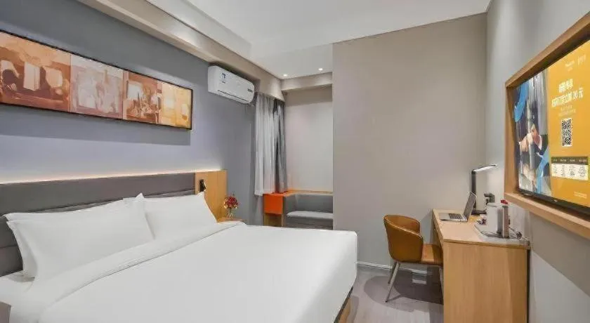 Bed in Jinjiang Inn Wuxi Liangqing Road Wanda Plaza Yunhe Bay Industrial Center