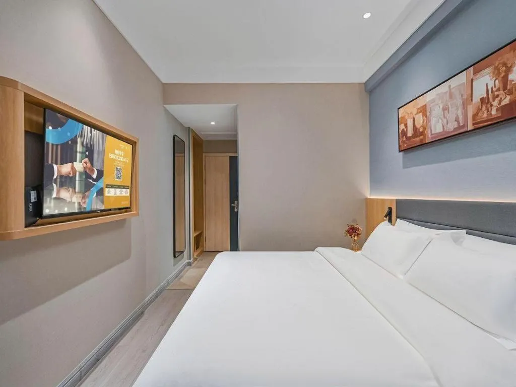Bed in Jinjiang Inn Wuxi Liangqing Road Wanda Plaza Yunhe Bay Industrial Center