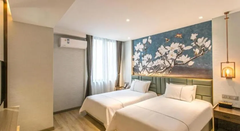 Bed in Magnotel Hotel Suzhou Shiquan Street Wangshiyuan