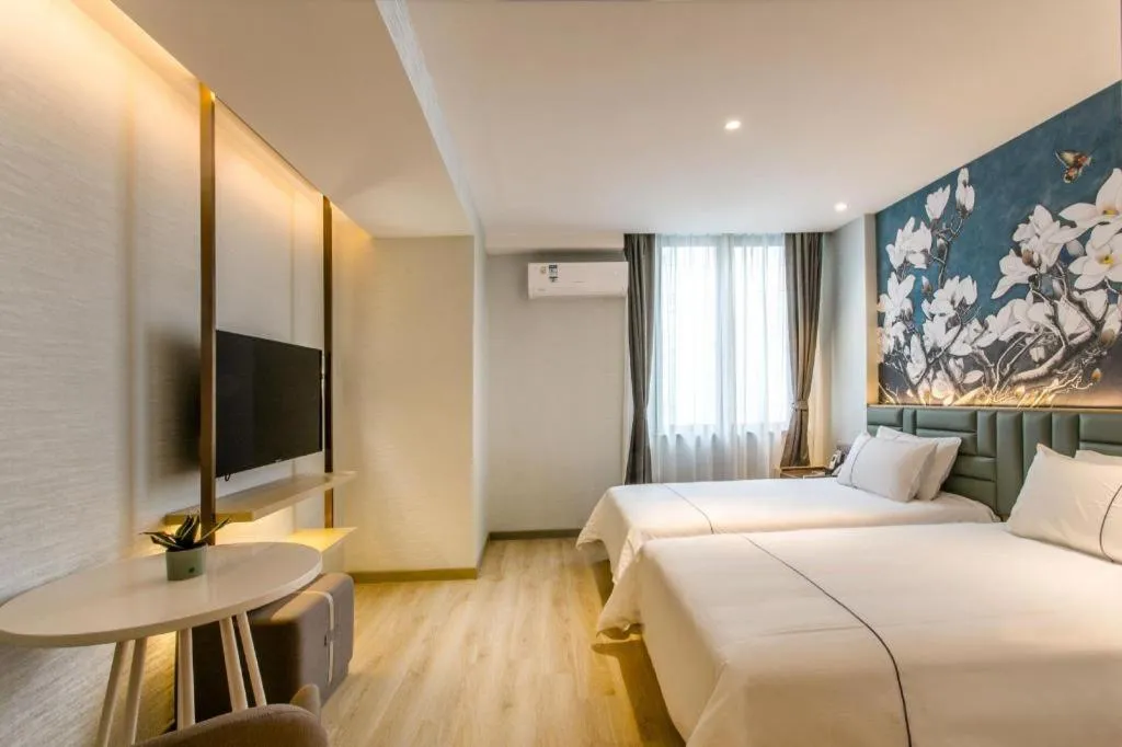 Bed in Magnotel Hotel Suzhou Shiquan Street Wangshiyuan