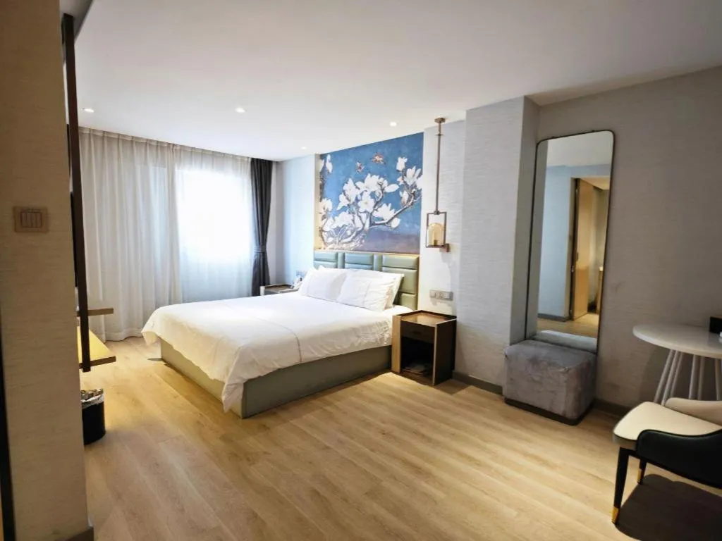 Bed in Magnotel Hotel Suzhou Shiquan Street Wangshiyuan