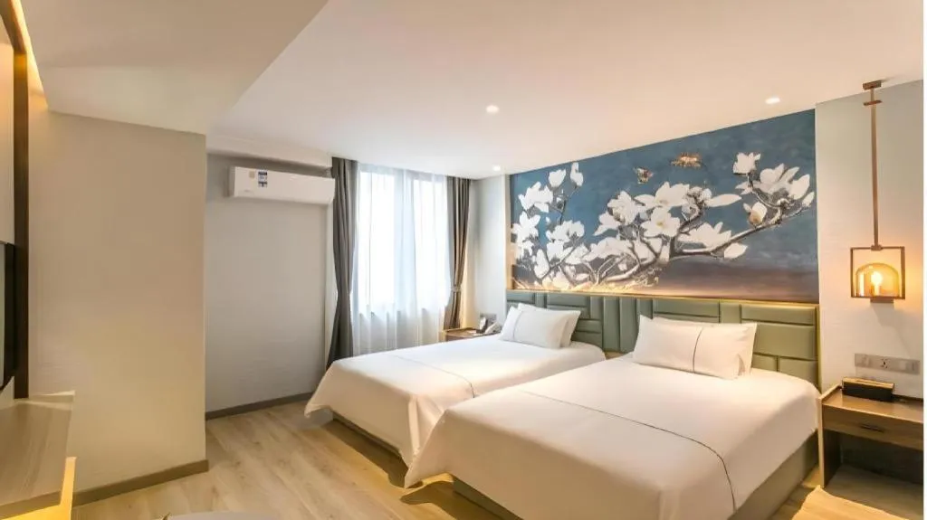 Bed in Magnotel Hotel Suzhou Shiquan Street Wangshiyuan