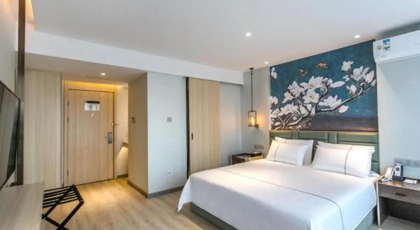 Bed in Magnotel Hotel Suzhou Shiquan Street Wangshiyuan