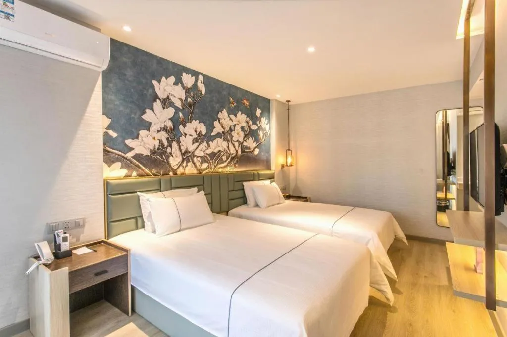 Bed in Magnotel Hotel Suzhou Shiquan Street Wangshiyuan