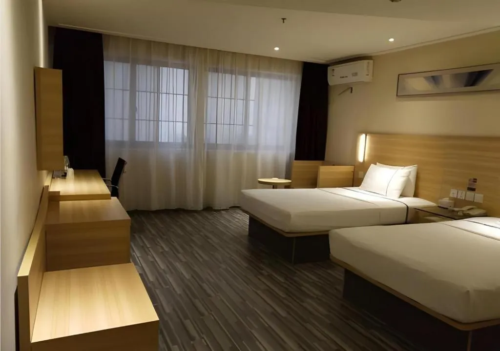 Bed in City Comfort Inn Wuhan Wangjiawan Yulong Road Metro Station
